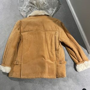Back of shearling coat I posted this morning don’t know how to attach it sorry